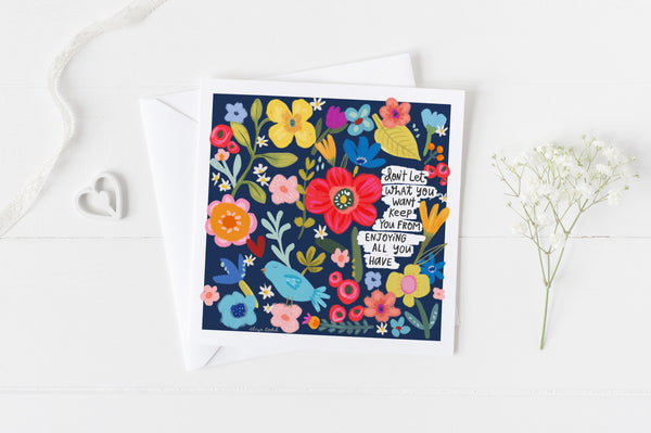 5x5 greeting card by Eliza Todd featuring colorful flowers saying "Don't let what you want keep you from enjoying all you have." - APeaceofWerk.com