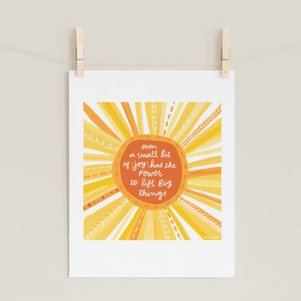 Fine art print by Eliza Todd featuring bright sun and saying "Even a small bit of joy has the power to lift big things." - APeaceofWerk.com