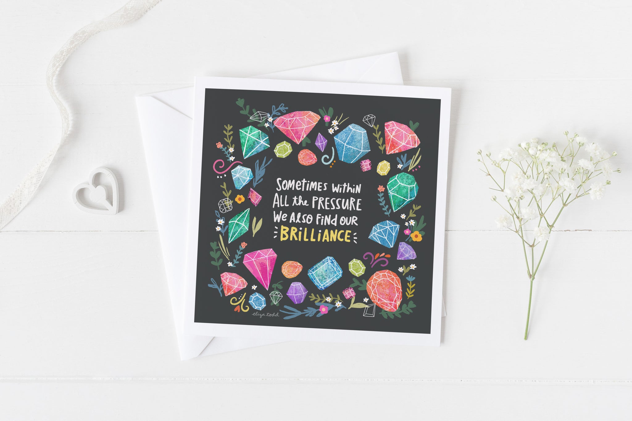 5x5 greeting card by Eliza Todd featuring shining gemstones and "Sometimes within all the pressure, we also find our brilliance." - APeaceofWerk.com