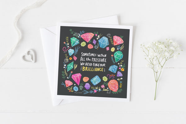 5x5 greeting card by Eliza Todd featuring shining gemstones and "Sometimes within all the pressure, we also find our brilliance." - APeaceofWerk.com
