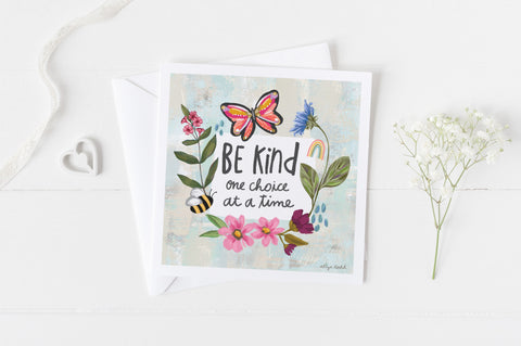 5x5 greeting card by Eliza Todd featuring flowers and cute insects, saying "Be kind one choice at a time." - APeaceofWerk.com